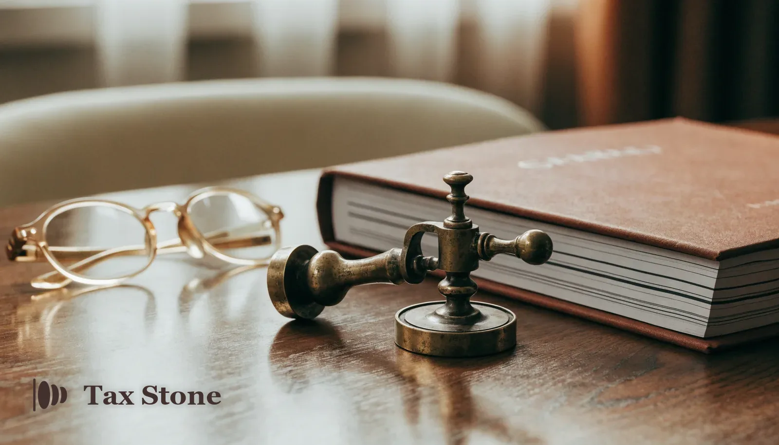 TaxStone hero image — a brass balance scale weighing US and UK coins on a dark walnut desk, illustrating the Section 962 election trade-off for American owners of UK limited companies.