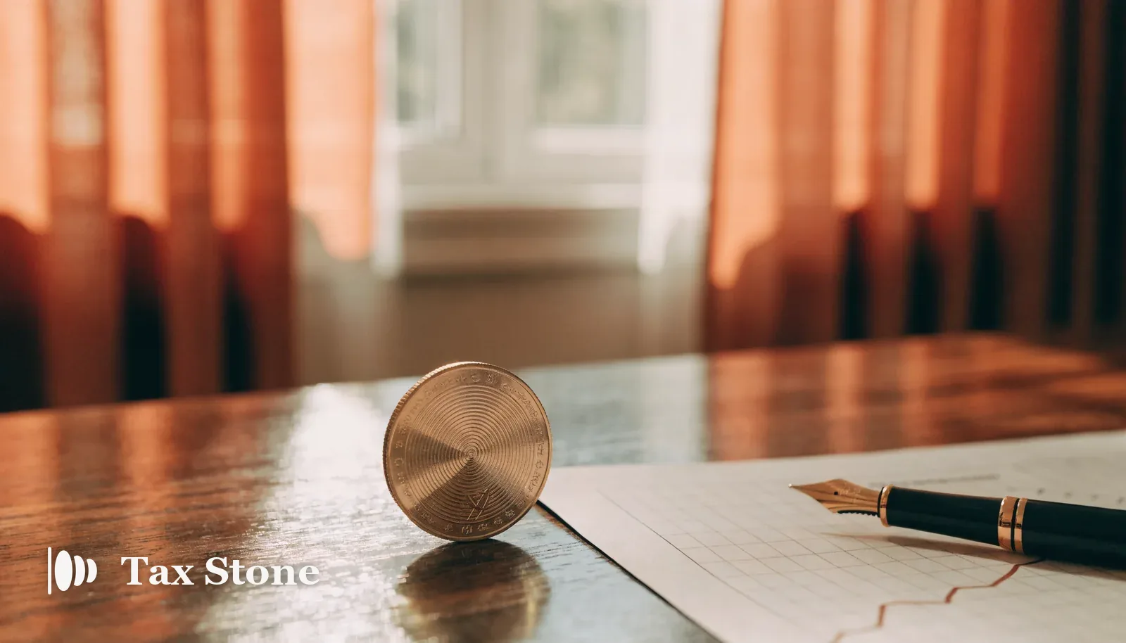 A gold-coloured crypto coin beside a rising financial chart and a fountain pen — TaxStone US crypto capital gains tax calculator